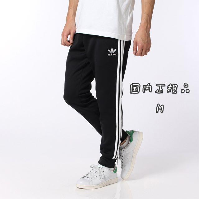 adidas(アディダス)の黒 M【新品/即日発送OK】adidas オリジナルス トラックトップ パンツ メンズのパンツ(ワークパンツ/カーゴパンツ)の商品写真