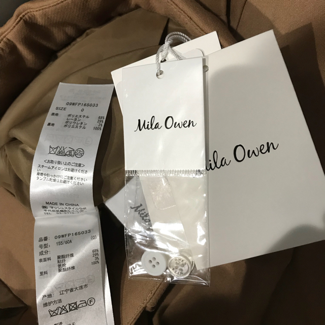 Mila Owen(ミラオーウェン)のMila Owen ミラオーウェン リングベルト付き テーパード パンツ  レディースのパンツ(カジュアルパンツ)の商品写真