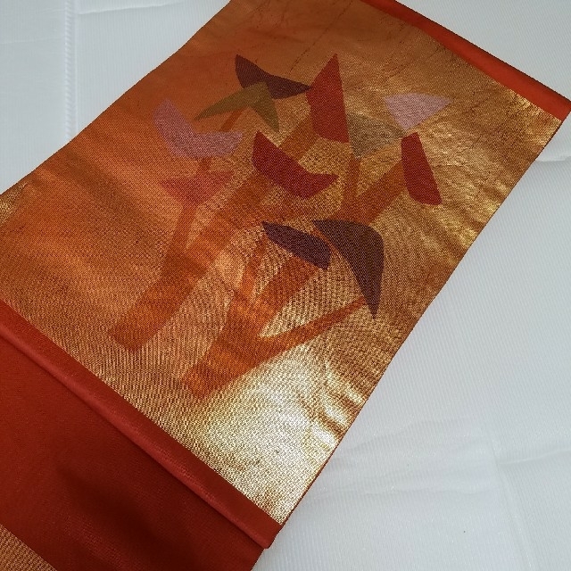 名古屋帯  オレンジ色  樹木の幾何学模様  金彩 レディースの水着/浴衣(帯)の商品写真