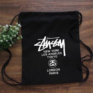 STUSSY - 新品未使用 stussy ナップサック 【STバック黒】の通販 by ...