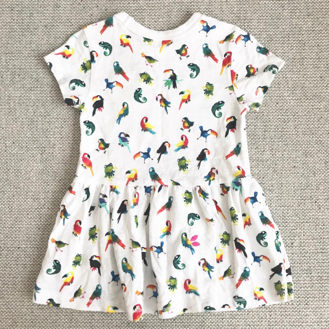 NEXT(ネクスト)の【美品】next 半袖ワンピース チュニック オウム鳥柄 6-9m 74cm キッズ/ベビー/マタニティのベビー服(~85cm)(ワンピース)の商品写真