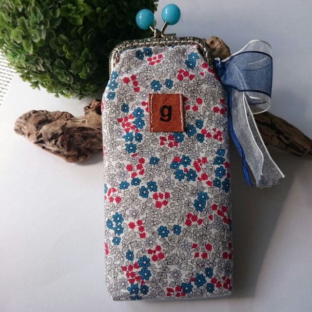 トリコロール花柄×水色あめ玉がまぐちポーチ レディースのバッグ(ボディバッグ/ウエストポーチ)の商品写真