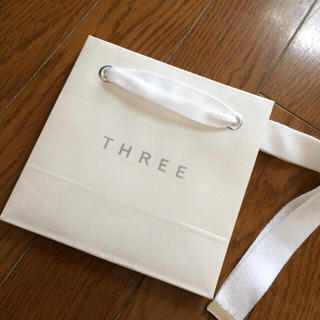 スリー(THREE)のTHREE 紙袋(ショップ袋)