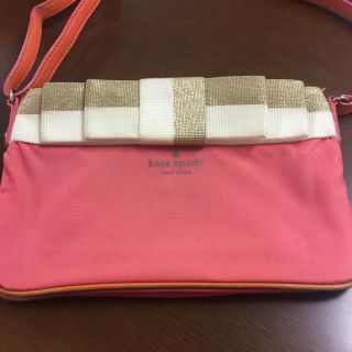 ケイトスペードニューヨーク(kate spade new york)のkate spade ショルダーバッグ リボン 赤 オレンジ(ショルダーバッグ)