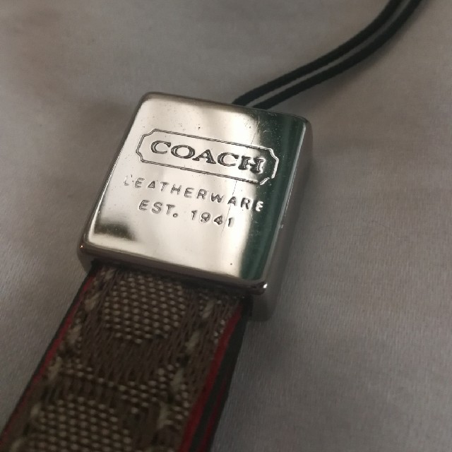 COACH(コーチ)のCOACHストラップ スマホ/家電/カメラのスマホアクセサリー(ストラップ/イヤホンジャック)の商品写真