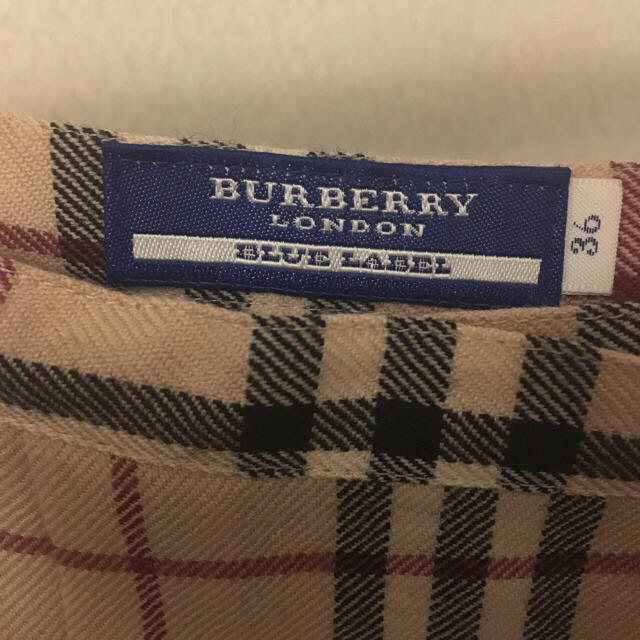 BURBERRY BLUE LABEL(バーバリーブルーレーベル)の【バーバリーブルーレーベル】ミニ巻きスカート レディースのスカート(ミニスカート)の商品写真