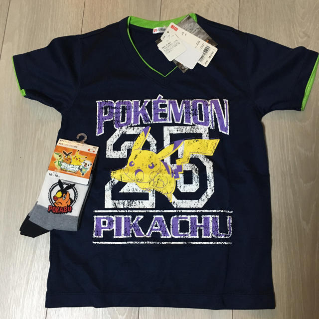 ポケモン(ポケモン)のPOKEMON ピカチュ ネイビーTシャツ130 美品 キッズ/ベビー/マタニティのキッズ服男の子用(90cm~)(Tシャツ/カットソー)の商品写真