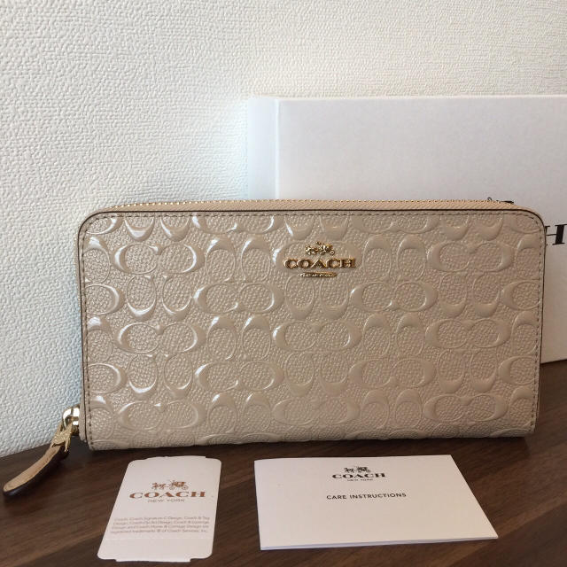 COACH コーチ プラチナム ベージュ シグネチャー エンボス 長財布