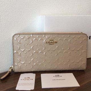 コーチ(COACH)のCOACH コーチ プラチナム ベージュ シグネチャー エンボス 長財布 (財布)