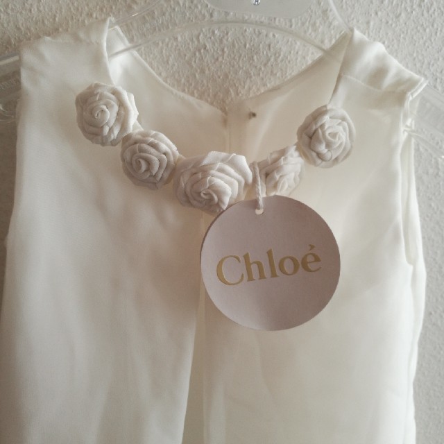 Chloe(クロエ)のsakura 様専用　Chloe　ワンピース　新品タグ付き キッズ/ベビー/マタニティのキッズ服女の子用(90cm~)(ワンピース)の商品写真