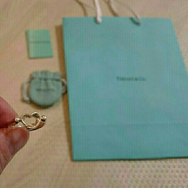 Tiffany & Co.(ティファニー)のnyam様専用 TIFFANY ミニオープンハート USED品 巾着&紙袋付 レディースのアクセサリー(リング(指輪))の商品写真