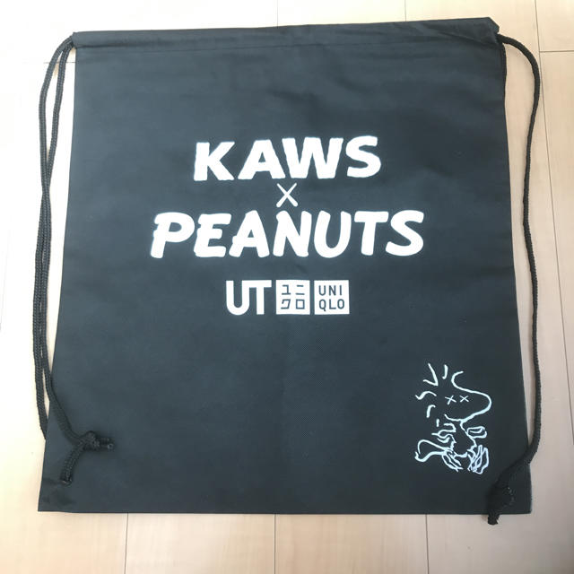 UNIQLO(ユニクロ)の未使用 KAWS × PEANUTS ユニクロ バッグ ナップサック メンズのバッグ(エコバッグ)の商品写真