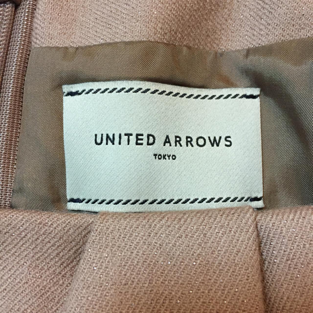 UNITED ARROWS(ユナイテッドアローズ)の美品 ユナイテッドアローズ 膝丈ベージュラップスカート 34 レディースのスカート(ひざ丈スカート)の商品写真