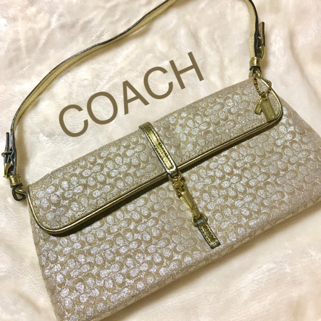 COACH(コーチ)のコーチ COACH バッグ クラッチバッグ ポーチ ゴールド 限定 レディースのバッグ(ハンドバッグ)の商品写真