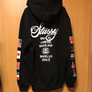 ステューシー(STUSSY)のパーカー 国旗 stussy 新品(パーカー)