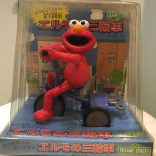 セサミストリート(SESAME STREET)の★値下げ★エルモの三輪車★ゼンマイネジ(キャラクターグッズ)