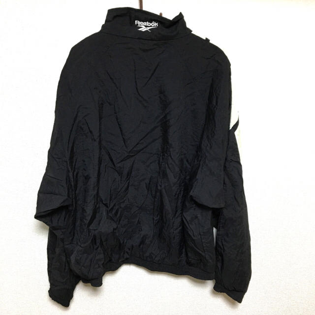 Reebok(リーボック)の90s Reebok リーボック ナイロンジャケット L ロゴ 古着 黒 メンズのジャケット/アウター(ナイロンジャケット)の商品写真