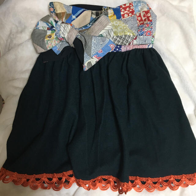 ヴィンテージ生地で作られたウールの巻きスカート レディースのスカート(ひざ丈スカート)の商品写真