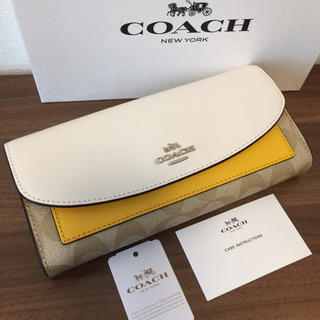 コーチ(COACH)のCOACH コーチ スリムウォレット バナナ チョーク 黄色 長財布(財布)