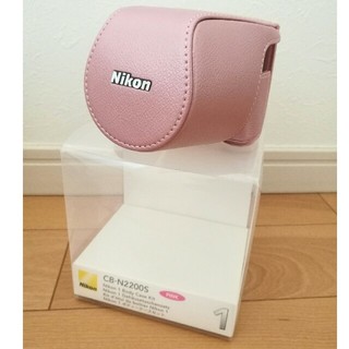 ニコン(Nikon)の(専用品)　Nikon1 ボディケース　(ピンク)(ミラーレス一眼)