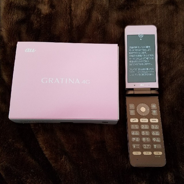 京セラ(キョウセラ)の新品　GRATINA 4G 　simロック解除　KYF31　ピンク スマホ/家電/カメラのスマートフォン/携帯電話(携帯電話本体)の商品写真