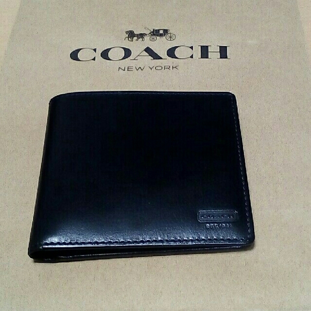 COACH(コーチ)の☆新品☆COACHメンズ二つ折り財布ショップ袋付き メンズのファッション小物(折り財布)の商品写真