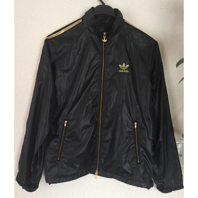 adidas(アディダス)のadidas adidas Originals BLACK / GOLD   メンズのジャケット/アウター(ナイロンジャケット)の商品写真