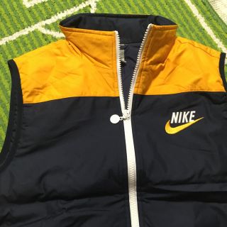 ナイキ(NIKE)の引越しセール！未使用ナイキ中綿ベスト150オレンジ紺(ジャケット/上着)