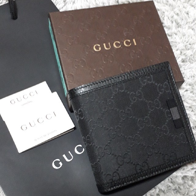 新品未使用GUCCI二つ折り財布ブラック | フリマアプリ ラクマ