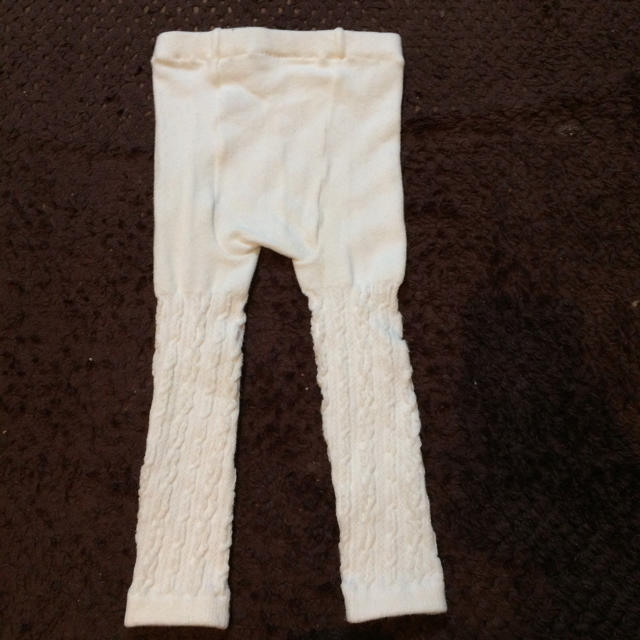 UNIQLO(ユニクロ)のユニクロ ニットレギンス 白 80サイズ キッズ/ベビー/マタニティのベビー服(~85cm)(パンツ)の商品写真