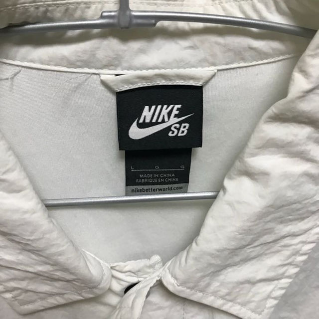 NIKE(ナイキ)の再値下げしました  NIKE コーチジャケット 白 メンズのジャケット/アウター(スタジャン)の商品写真