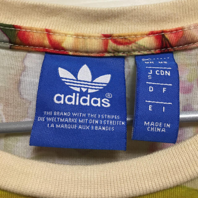 adidas(アディダス)のインパクト大 花柄Tシャツ イエローベース レディースのトップス(Tシャツ(半袖/袖なし))の商品写真