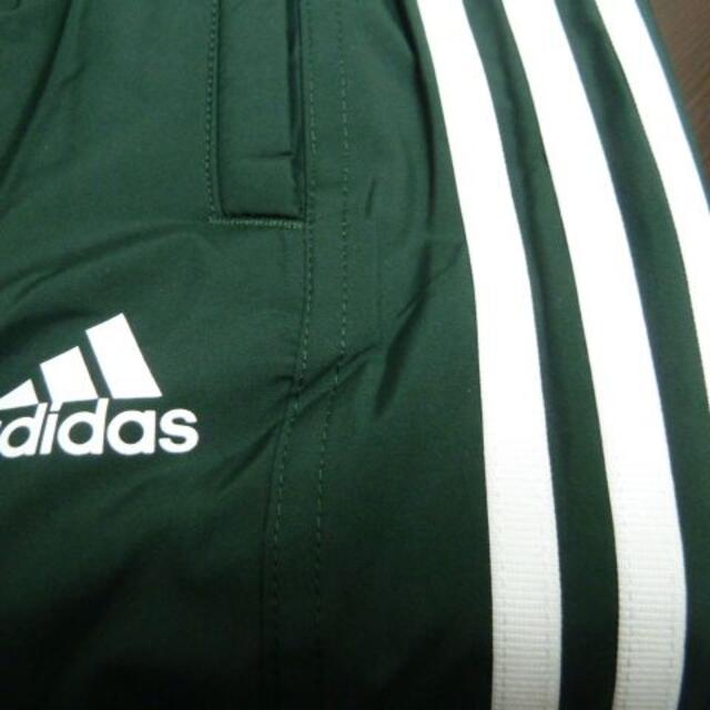 adidas(アディダス)のXO 緑)アディダス ウィンドブレーカーパンツ DUQ94 中綿入りロングパンツ スポーツ/アウトドアのサッカー/フットサル(ウェア)の商品写真