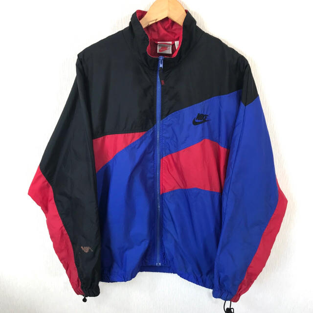 NIKE(ナイキ)の訳あり 良柄 ☆ 90s NIKE ナイロンジャケット マルチカラー L 銀タグ メンズのジャケット/アウター(ナイロンジャケット)の商品写真