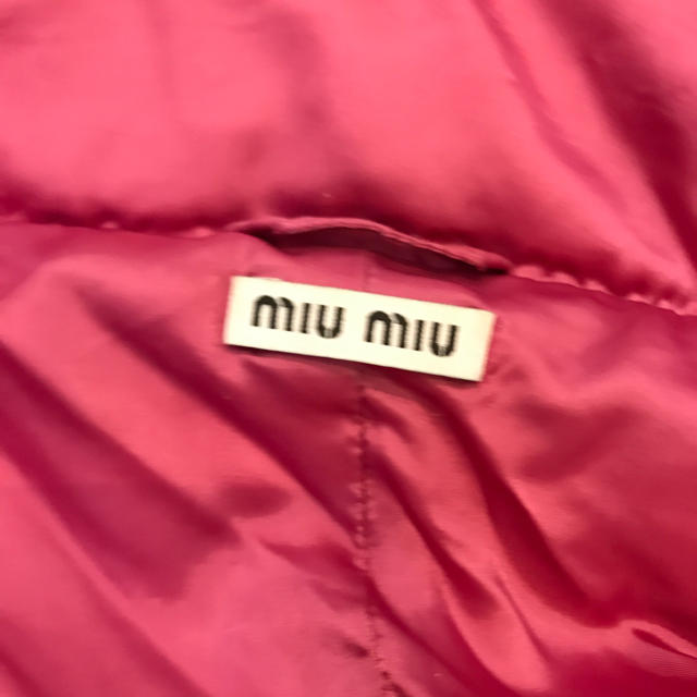 miumiu(ミュウミュウ)のmiumiu ミュウミュウ ピンクペプラムフリルダウンジャケット sacai レディースのジャケット/アウター(ダウンジャケット)の商品写真