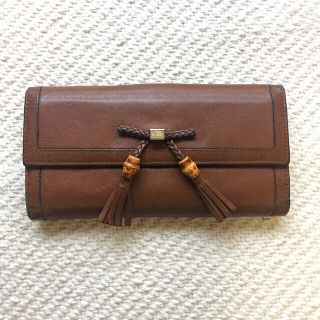 グッチ(Gucci)のGUCCI フリンジリボンの長財布 (箱・リボン付)(財布)