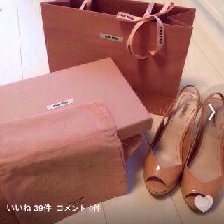 ミュウミュウ(miumiu)のmiumiuウェッジサンダル(サンダル)