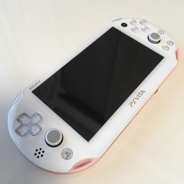 PlayStation Vita(プレイステーションヴィータ)のPSvita本体 PCH-2000 ライトピンク/ホワイト エンタメ/ホビーのゲームソフト/ゲーム機本体(携帯用ゲーム機本体)の商品写真