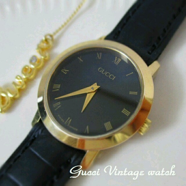 美品・ベルト新品 GUCCI 黒×金 腕時計