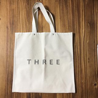 スリー(THREE)のTHREE生成り色帆布ロゴトートバック (トートバッグ)