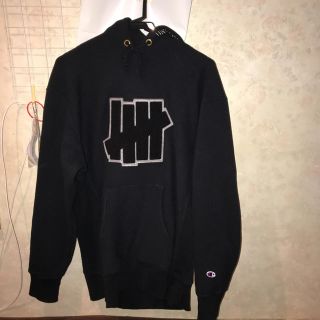 アンディフィーテッド(UNDEFEATED)のundefeated × champion パーカー(パーカー)