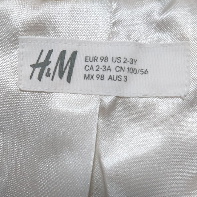 H&M(エイチアンドエム)の子供 ファーボレロ キッズ/ベビー/マタニティのキッズ服女の子用(90cm~)(ドレス/フォーマル)の商品写真