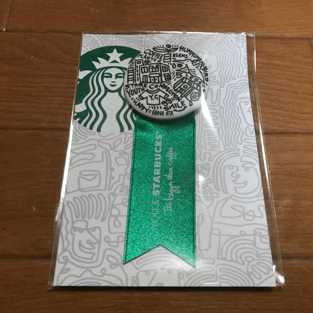 Starbucks Coffee(スターバックスコーヒー)の非売品！STARBUCKS リボンメダル グリーン スターバックス スタバ エンタメ/ホビーのコレクション(ノベルティグッズ)の商品写真
