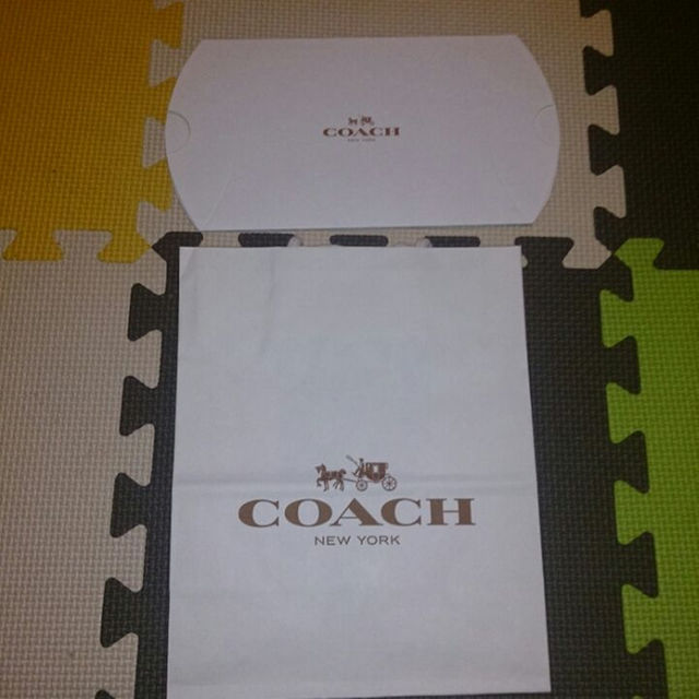 COACH(コーチ)のCOACHスマホケース☆ゴールド2 メンズのファッション小物(その他)の商品写真