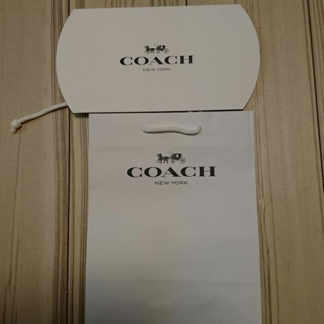 COACH(コーチ)のCOACHリストレット ピンク花柄 レディースのバッグ(ボディバッグ/ウエストポーチ)の商品写真