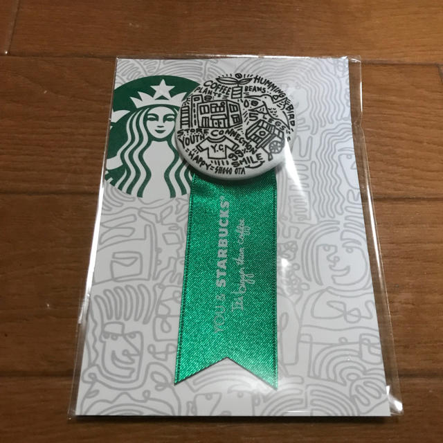 Starbucks Coffee(スターバックスコーヒー)の非売品！STARBUCKS リボンメダル グリーン スターバックス スタバ エンタメ/ホビーのコレクション(ノベルティグッズ)の商品写真