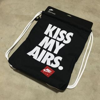 ナイキ(NIKE)のNIKE ” KISS MY AIRS ” GYMSACK ジムサック 黒 (リュック/バックパック)