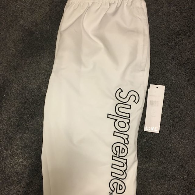 Supreme(シュプリーム)の[S]Supreme Lacoste Track Pants White メンズのパンツ(その他)の商品写真