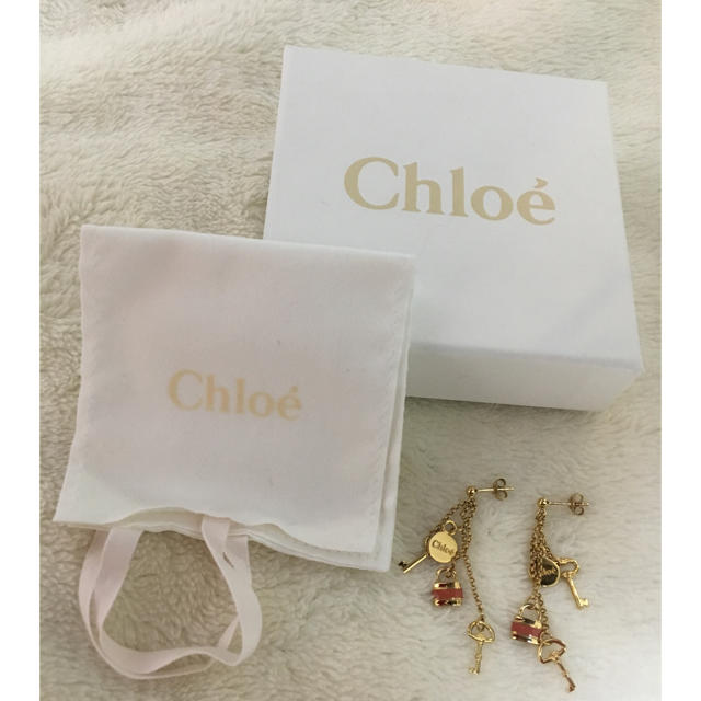 Chloe(クロエ)の[meg様 専用]  Chloe パトロック&キー ピアス (オレンジ) レディースのアクセサリー(ピアス)の商品写真