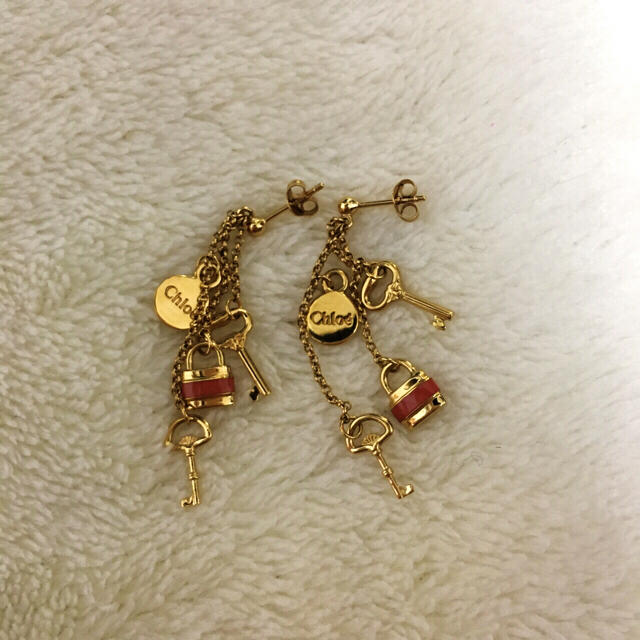 Chloe(クロエ)の[meg様 専用]  Chloe パトロック&キー ピアス (オレンジ) レディースのアクセサリー(ピアス)の商品写真